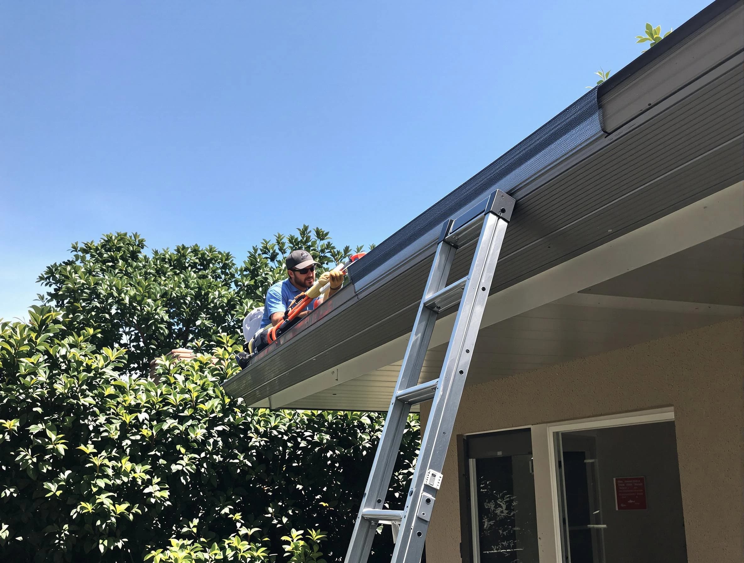 Avon Lake Roofing Company installing gutter guards for a homeowner in Avon Lake, OH