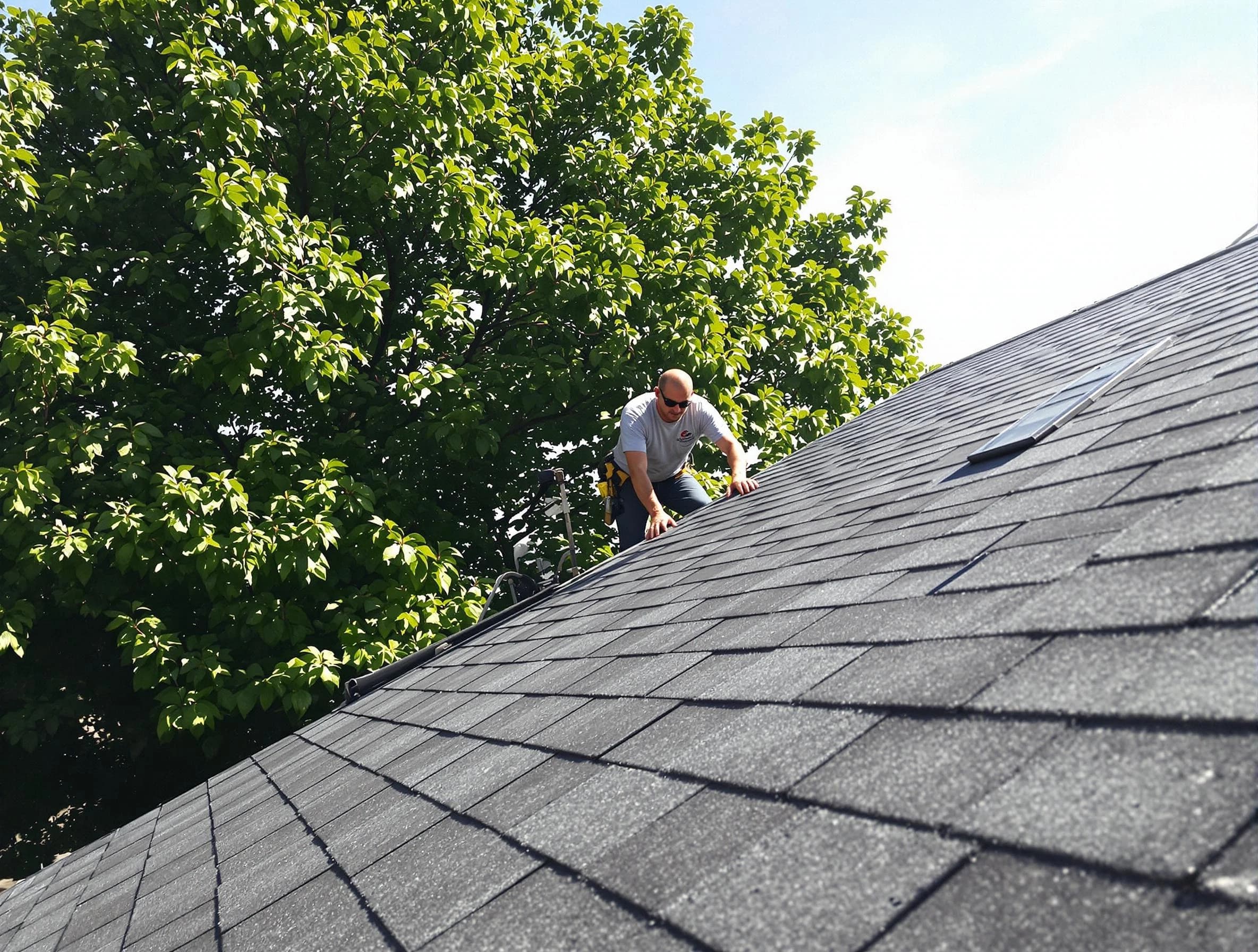 Certified roofers from Avon Lake Roofing Company working in Avon Lake, OH